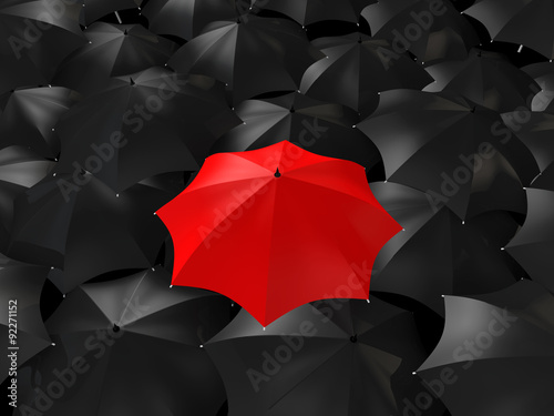 3d red umbrella among black ones