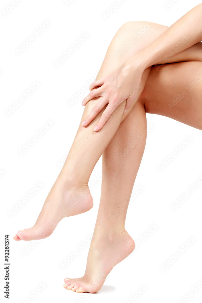 Female legs and hands, white background, isolated Female legs and hands, white background, isolated