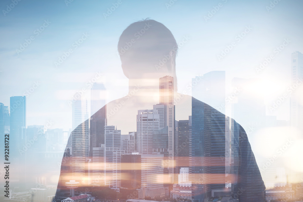 Double exposure of man and city on the background - obrazy, fototapety, plakaty 