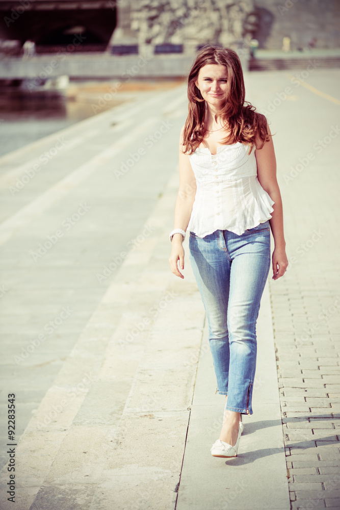 Portrait of a beautiful european woman smiling outdoors