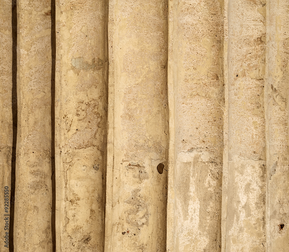 Texture of old wall covered with yellow stucco Texture of old wall covered with yellow stucco