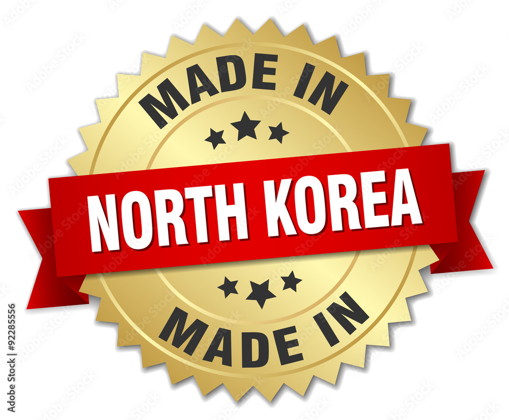made in North Korea gold badge with red ribbon made in North Korea gold badge with red ribbon