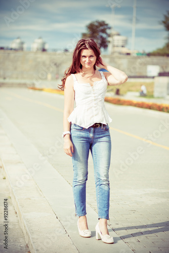 Portrait of a beautiful european woman smiling outdoors