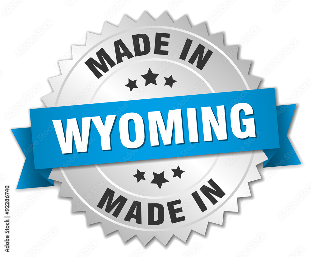 made in Wyoming silver badge with blue ribbon made in Wyoming silver badge with blue ribbon