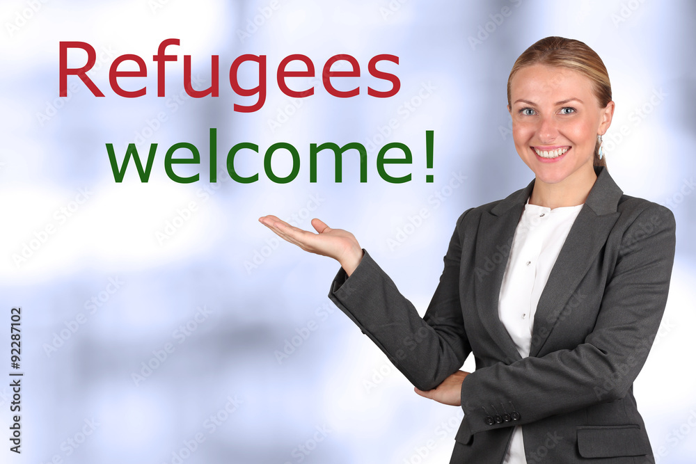 Smiling woman showing to sign Smiling woman showing to sign