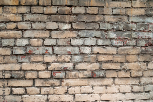 Texture of old gray brick wall