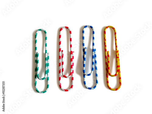 Four colorful paperclips