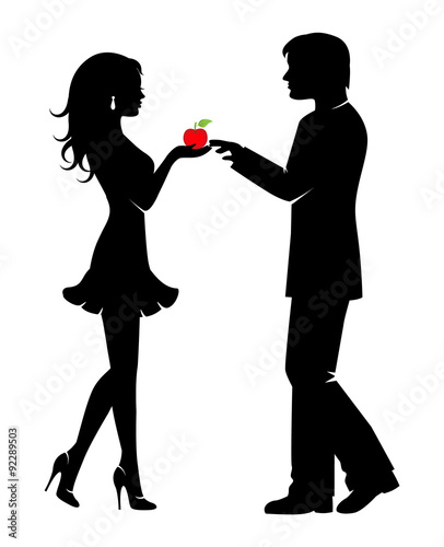 Beautiful elegant woman gives  man apple forbidden fruit