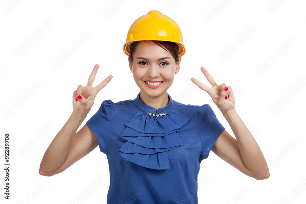 Asian engineer woman show victory sign with both hands Asian engineer woman show victory sign with both hands