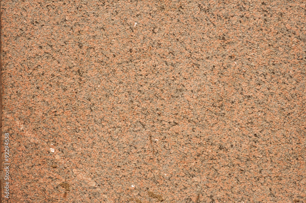 Texture of wall of polished pink granite Texture of wall of polished pink granite