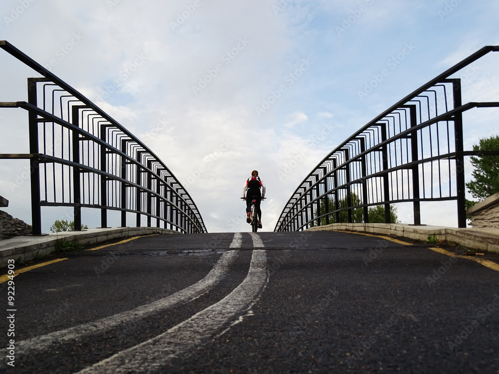 bike rides along bridge to the sky