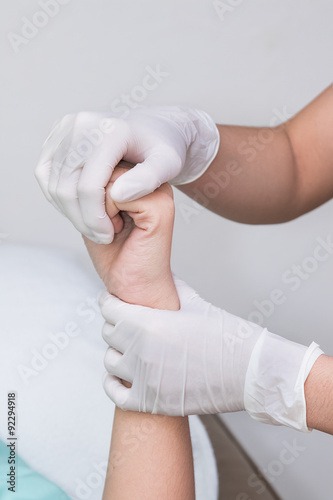 Patient doing physical exercises with physical therapist 