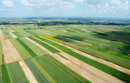 Aerial view of the countryside with village and fields of crops