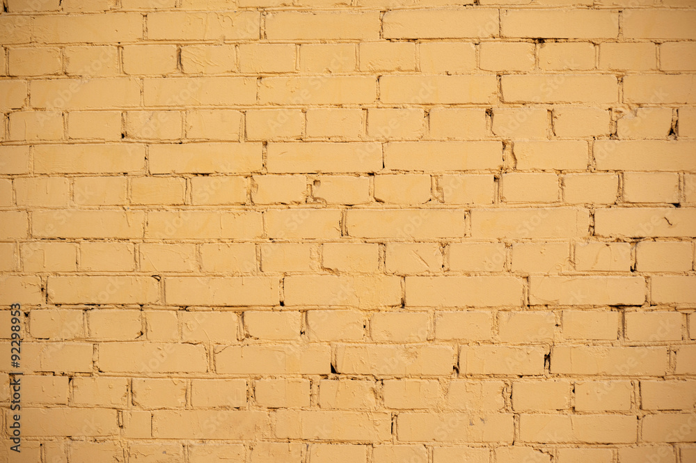 Fototapeta premium Texture of old yellow brick wall
