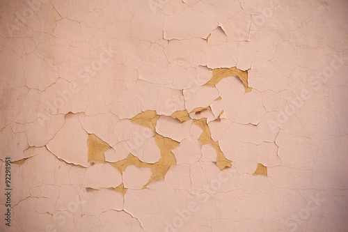 Texture of old wall covered with pink stucco