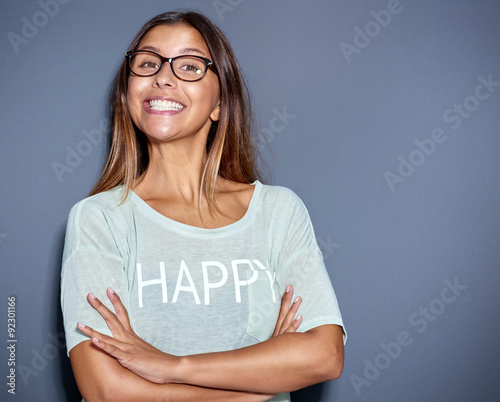 Lively young woman with a big cheesy grin