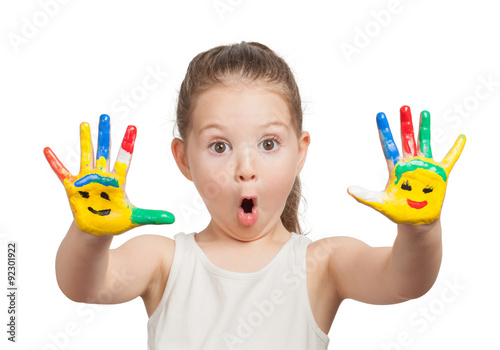 cute little girl with hands painted in colorful paints on white background