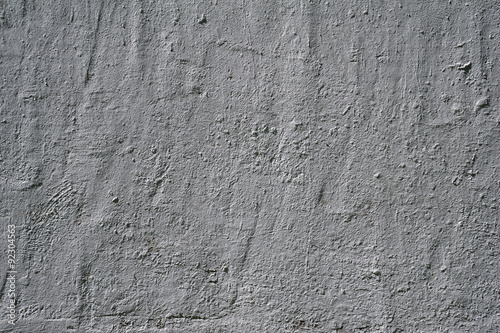 Texture of old wall covered with gray stucco