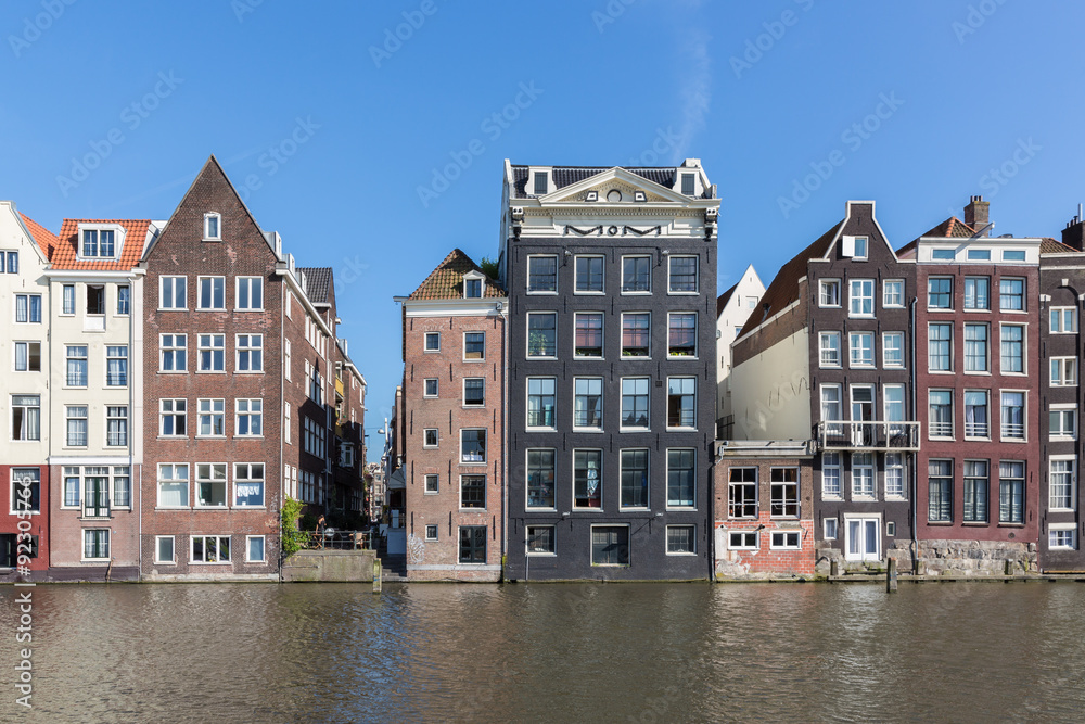 Amsterdam city with historic houses along Canals