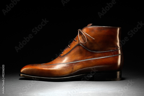 Elegant hand tooled brown leather shoe