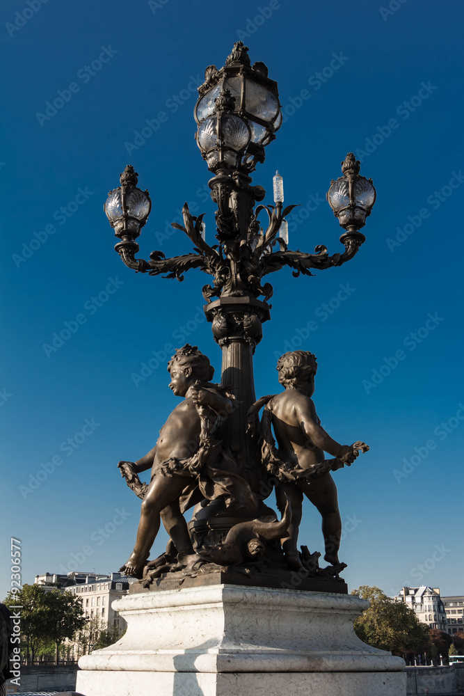 the bronze  statue of bridge Alexandre III, Paris, France.