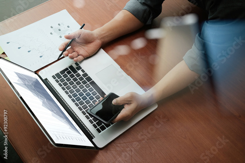 top view of Double exposure of businessman hand working with new