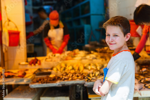 Teenage boy at market