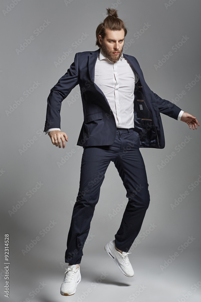 Portrait of an attractive guy wearing sports suit Portrait of an attractive guy wearing sports suit