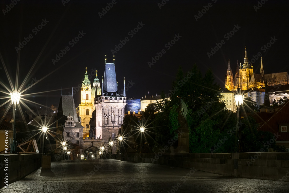 Fototapeta premium The Charles Bridge in the evening, in the light of lanterns. 