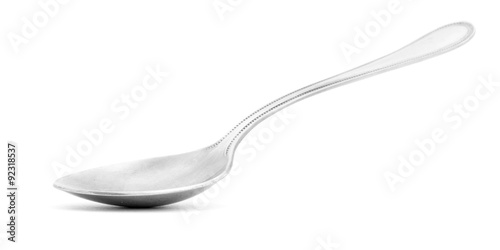 Gray metal shiny spoon isolated on white background