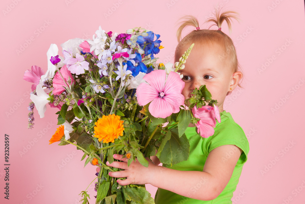 Toddler girl with flowers Toddler girl with flowers