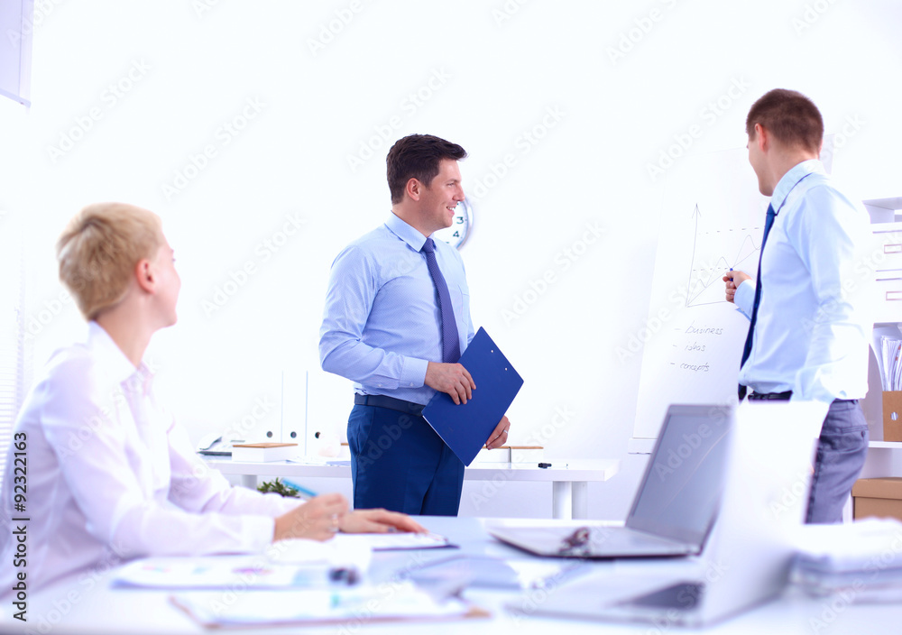 Business people sitting and discussing at business meeting, in Business people sitting and discussing at business meeting, in