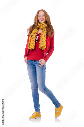 Cute smiling girl in red jacket and jeans isolated on white