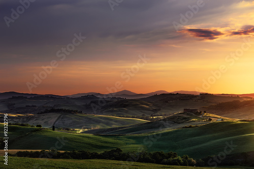 Tuscany spring, rolling hills on sunset. Volterra rural landscap