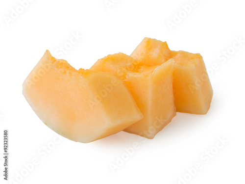 Cut cantaloupe on white background