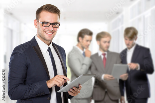 Group of businessman using tablet pc