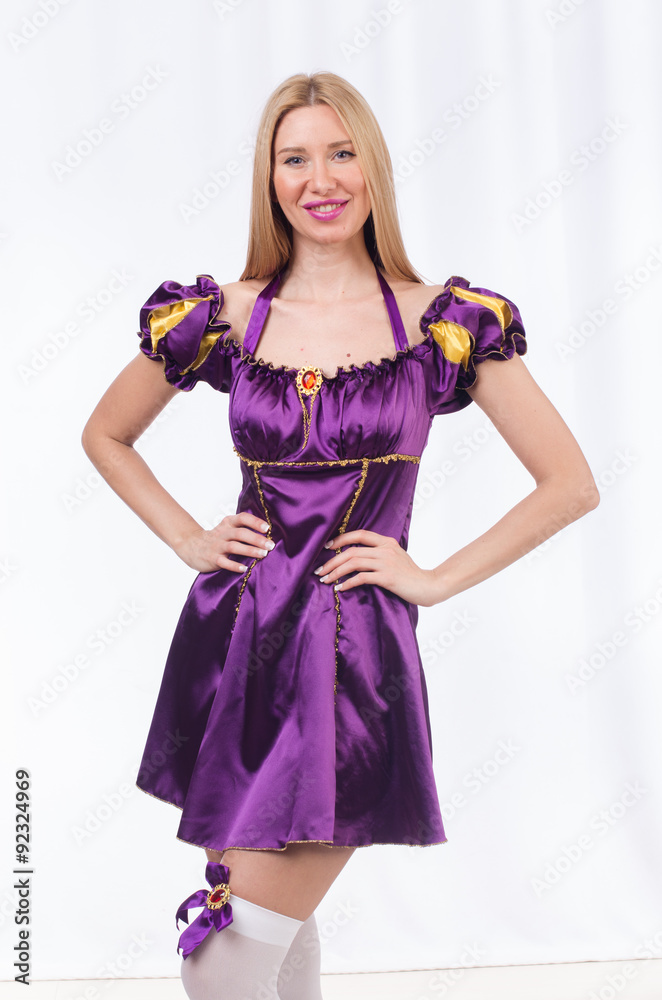 Cute girl in purple masquerade dress isolated on white Cute girl in purple masquerade dress isolated on white