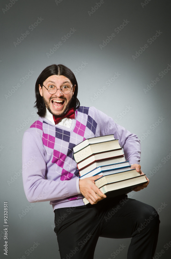Young student with book in learning concept Young student with book in learning concept
