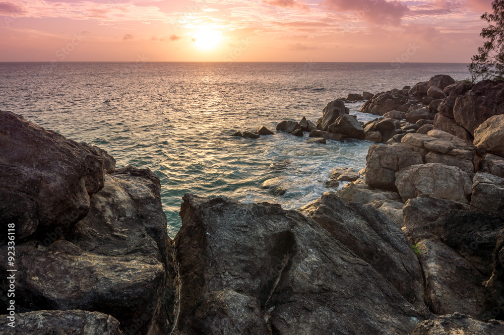 Beautiful sunset in the tropical beach Petite Anse Kerlan in Praslin Island, Seychelles. Beautiful sunset in the tropical beach Petite Anse Kerlan in Praslin Island, Seychelles.
