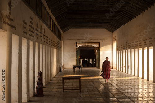 BAGAN, MYANMAR - MAY 3 : Monks in the entrance of Shwezigon Pagoda on May 3 ,2013 in Bagan, Myanmar. © fototrips