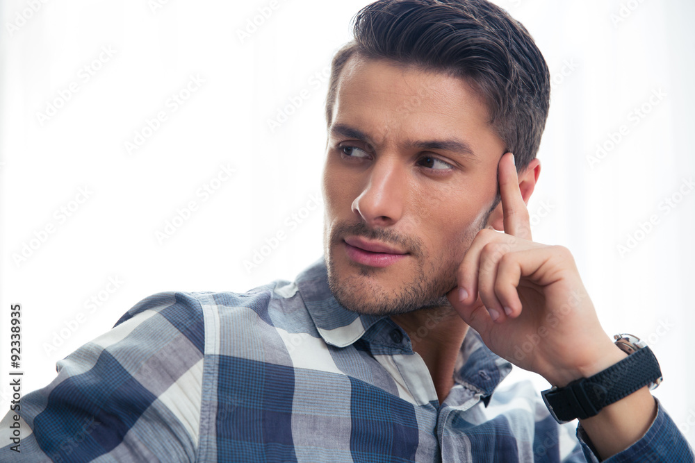 Portrait of a handsome casual man looking away Portrait of a handsome casual man looking away