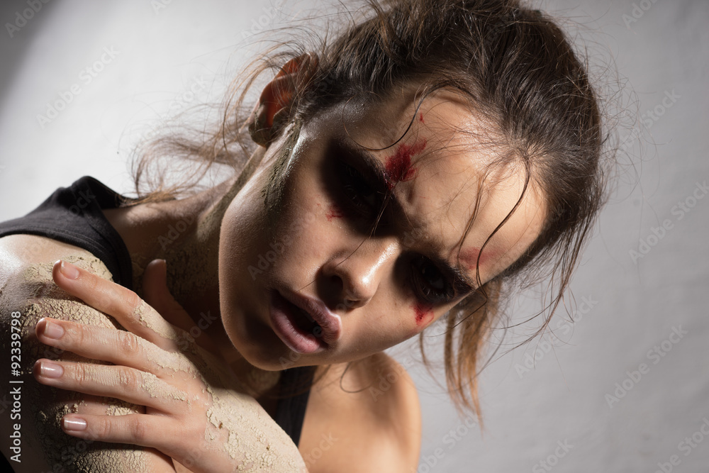 Naklejka premium Angry woman with wounds on his face