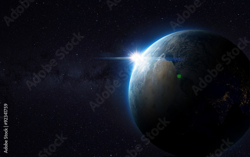 Fototapeta Naklejka Na Ścianę i Meble -  Earth view from space with sunrise. Elements of this image furnished by NASA