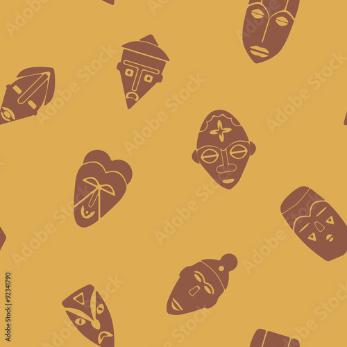 Seamless background with African ritual masks for your design
