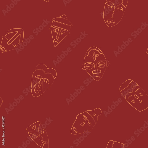 Seamless background with African ritual masks for your design