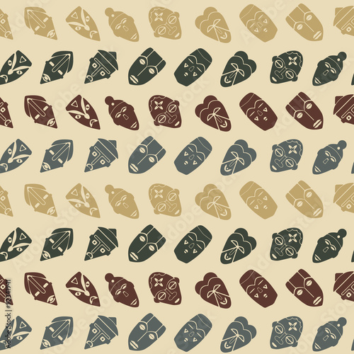 Seamless background with African ritual masks for your design