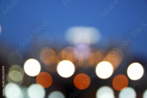 abstract image of blurred night city background with circle lights photo