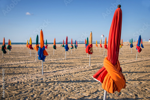 Colorful parasols on the famous beach of Deauville, Normandy, France