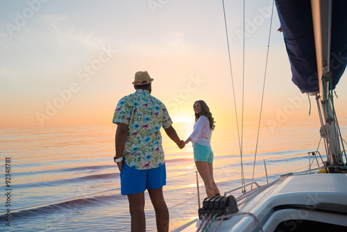 Date of guy and girl on a yacht.