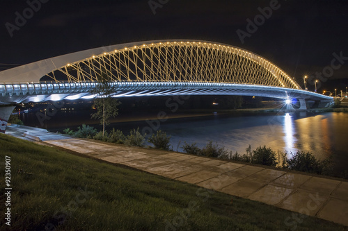 Modern lighted bridge in night for cars and trams in Troja, Prague, Czech republic